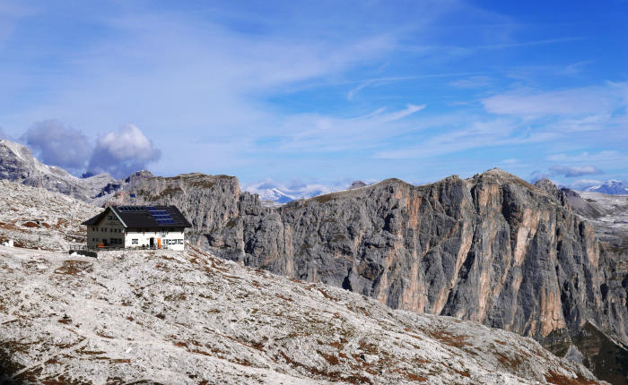 High-altitude mountain hut on the lunar plateau of Pale di San Martino along the Alta Via 2 route